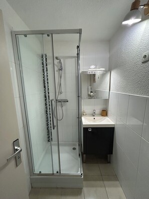 Shower, hair dryer