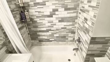 Hair dryer, towels, soap, shampoo