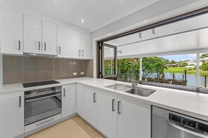 Fridge, microwave, oven, stovetop - Serene Lakefront Water side Villa with Private Pool  (Westlake)