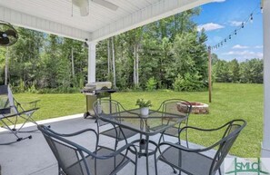 Outdoor dining - Beautiful Luxury Home with a Country Twist/ Spacious home with Half an acre! (Guyton)