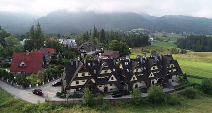 Apartament z basenem, sauną i widokiem na Tatry w Kościelisku k. Zakopanego.
