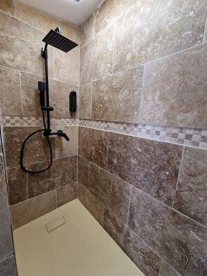 Shower, towels, soap, shampoo