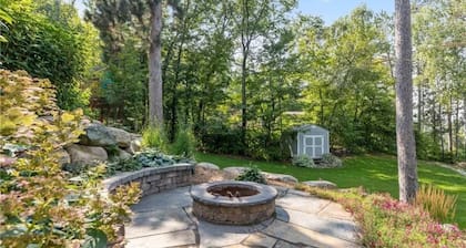 Relaxing retreat on Rice Lake! Quiet lake views w/full deck, fire pit, & hot tub