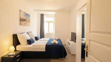 2 slaapkamers, een strijkplank/strijkijzer, reisbedje, gratis wifi