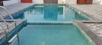 Idyllic Getaway Amidst Guava And Mango Trees