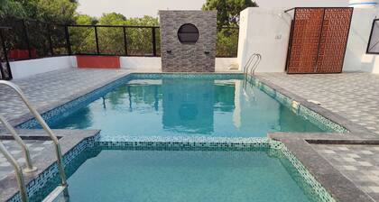 Idyllic Getaway Amidst Guava And Mango Trees