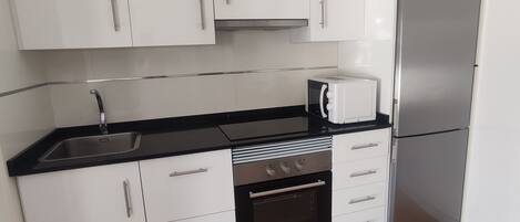 Fridge, microwave, oven, coffee/tea maker