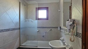 Hair dryer, bidet, towels, soap