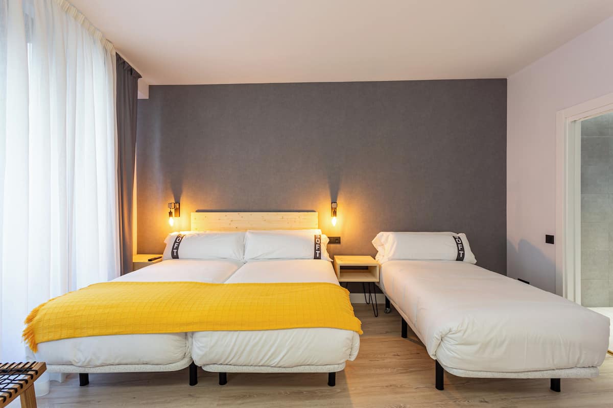Memory-foam beds, in-room safe, desk, laptop workspace