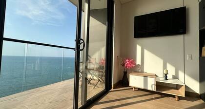 New apartment with view to the ocean, just steps away from the beach to enjoy
