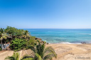 On the beach, sun loungers, beach towels