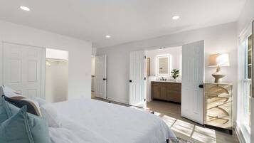 1 bedroom, desk, iron/ironing board, travel crib