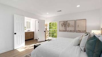 1 bedroom, desk, iron/ironing board, travel crib