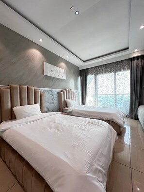 2 habitaciones y ropa de cama