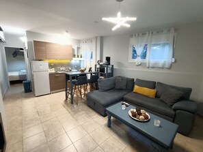 Lägenhet City | Vardagsrum | 55-tums smart-tv med satellitkanaler