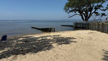 On the beach, sun loungers