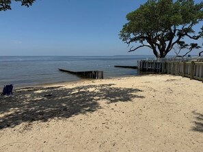 On the beach, sun-loungers