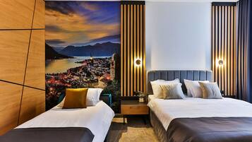 Habitación doble Deluxe | Camas extra