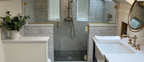 Shower, hair dryer, towels, soap