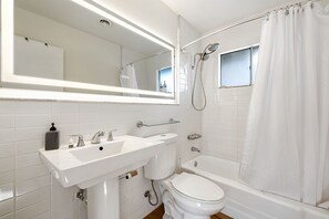 Hair dryer, towels, soap, shampoo
