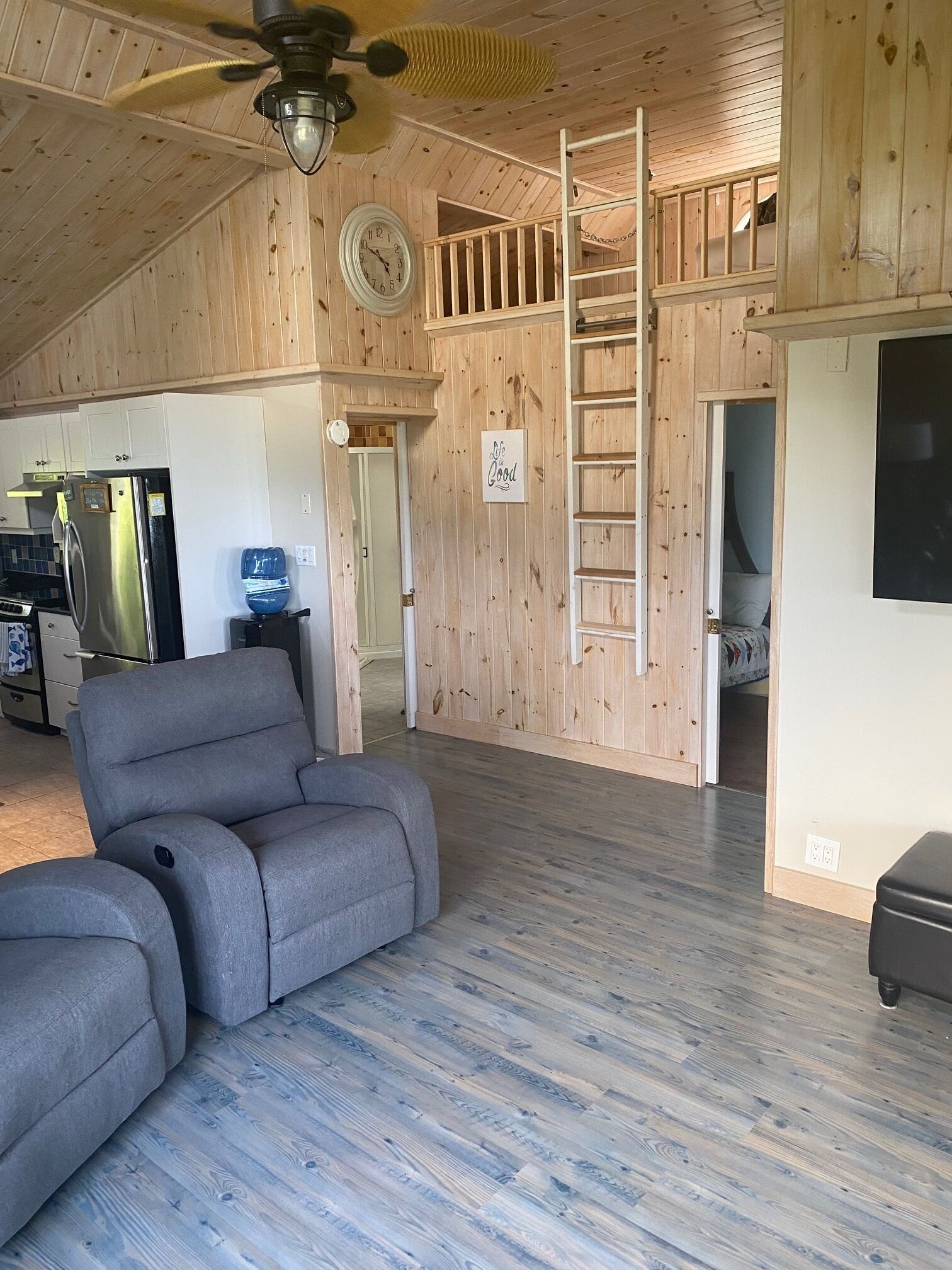 Living room with ladder to loft