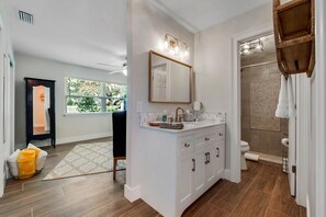 Shower, hair dryer, towels, soap