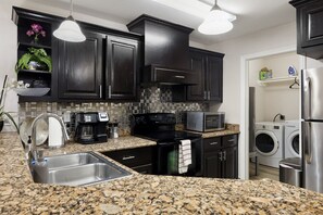 Fridge, microwave, oven, stovetop - Sharyland Townhome - 2/2.5 bedrooms with patio in McAllen (McAllen)