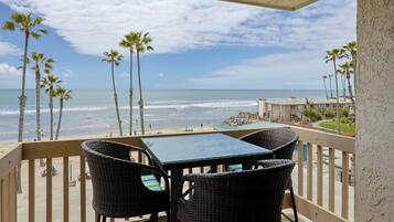 Condo, Multiple Beds, Balcony, Ocean View (A225 Sunset Bliss) | Outdoor dining