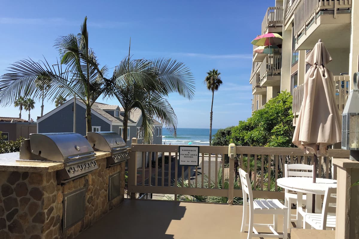 Condo, Multiple Beds, Balcony, Ocean View (A303 California Dreamin') | Outdoor dining