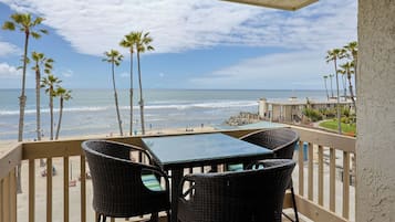 Condo, Multiple Beds, Balcony, Ocean View (A225 Sunset Bliss) | Outdoor dining