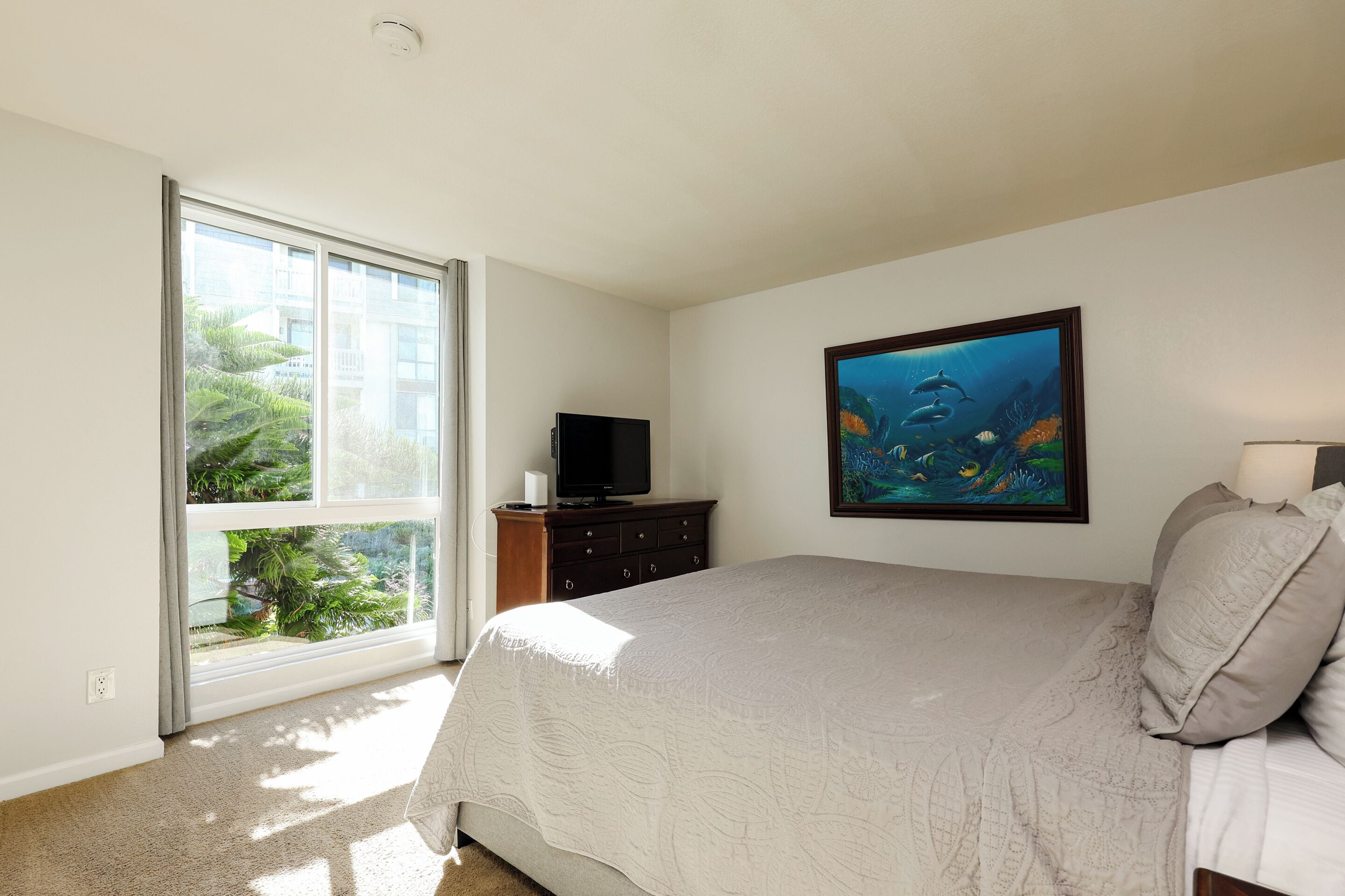 Condo, 1 King Bed with Sofa bed, Balcony, Ocean View (F006 Serenity by the Sea) | 2 bedrooms, individually decorated, individually furnished, bed sheets
