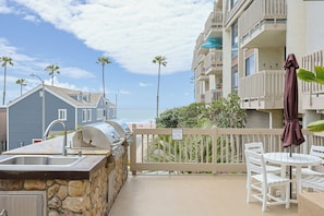Condo, Multiple Beds, Balcony, Ocean View (A225 Sunset Bliss) | Outdoor dining
