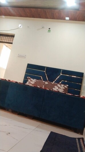 Deluxe Quadruple Room, City View | Soundproofing, free WiFi, bed sheets - Goroomgo Kunj Residency Mathura (Mathura)