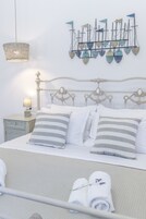 Apartamento família, 3 quartos | 3 quartos, roupas de cama premium, camas com colchões pillow-top