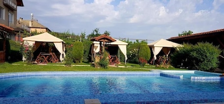 Seasonal outdoor pool. Sharkov Family Hotel