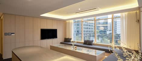 Hypo-allergenic bedding, desk, laptop workspace, blackout curtains