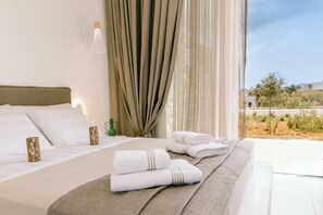 Egyptian cotton sheets, premium bedding, memory-foam beds, in-room safe - Orelia Luxury Villas (Karpathos)