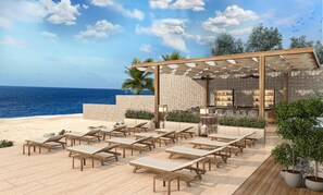 Plage privée, cabines gratuites, chaises longues, parasols