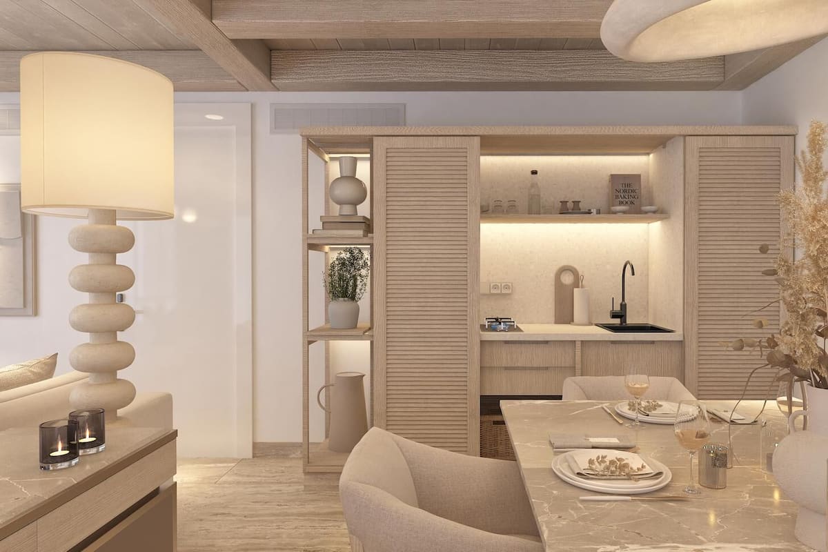 A modern kitchen with a built-in island, wooden cabinetry, and a pendant light.