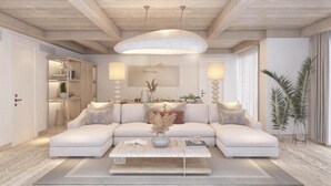 A modern living room with a sectional sofa, a coffee table, and a pendant light. - Ruins Luxury Resort (Bodrum)
