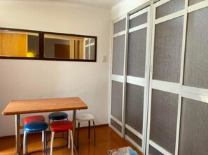 Standard Room, 2 Bedrooms, Non Smoking, Kitchenette | In-room dining
