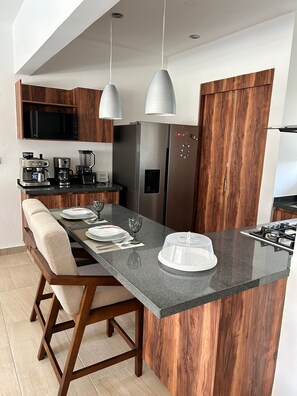 Fridge, microwave, coffee/tea maker, blender