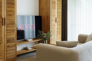 65-inch Smart TV with digital channels, Netflix, streaming services - Sunny Aparts 1 (Canggu)