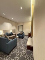 Suite, 1 King Bed, Corner | In-room safe, iron/ironing board, free WiFi, bed sheets