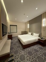 Deluxe Room | In-room safe, iron/ironing board, free WiFi, bed sheets