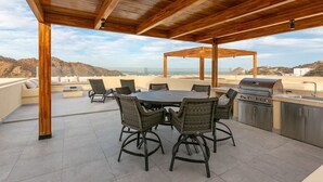 Unclassified image, 4 of 44, button - This brand-new 2-bedroom, 2-bath condo offers modern comfort with a stylish open layout and fully equipped kitchen. Enjoy a private rooftop terrace with outdoor kitchen and panoramic views—perfect for relaxing and taking in the beauty of Vista Mare. (Cabo San Lucas)