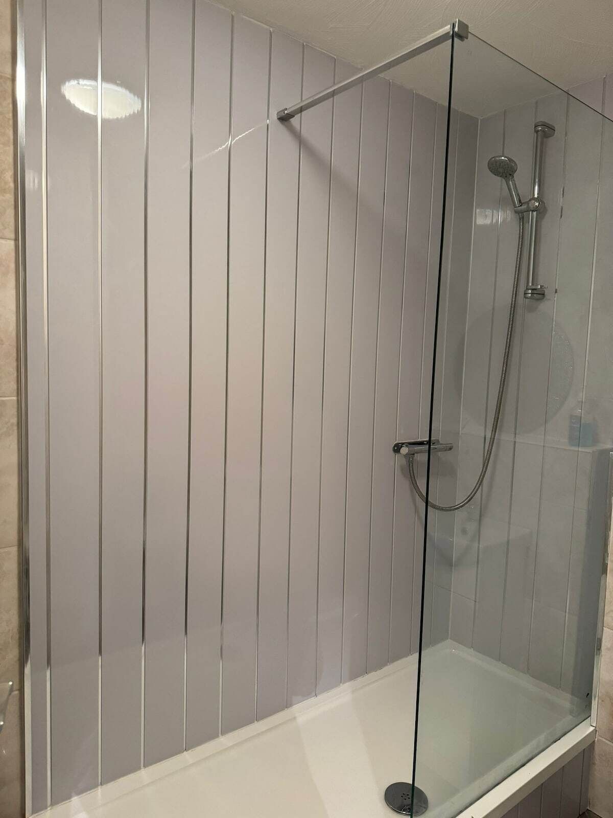 Shower, towels, soap, toilet paper