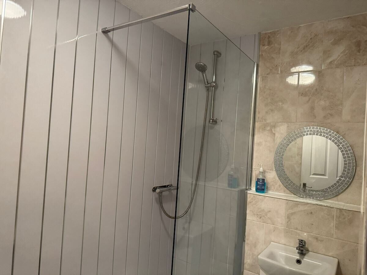Shower, towels, soap, toilet paper