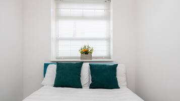 3 dormitorios, tabla de planchar con plancha, wifi gratis y ropa de cama