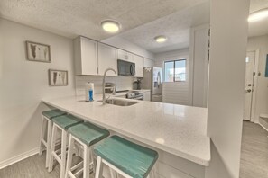 Fridge, microwave, oven, stovetop - Stunningly Remodeled 2-Bedroom Townhouse Across the Street From the Beach! (Panama City Beach)